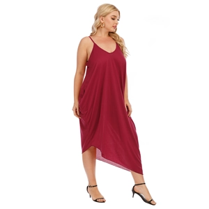 Detail of wine red V-neck dress featuring unique asymmetrical hem and dual side pockets