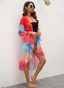Close-up of lightweight colorful tie-dye mesh kimono with sheer fabric texture