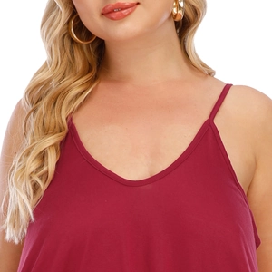 Detail of burgundy plus size dress featuring thin straps and V-neckline fabric