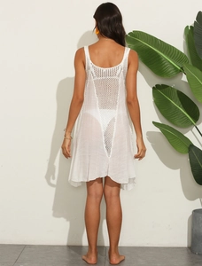 Detail view of the white crochet hollow-out panel on the back of the beach cover-up dress