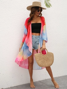 Close-up of lightweight tie-dye chiffon beach cardigan with vibrant multi-color print