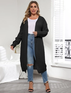 Detail of black longline knit cardigan with ribbed cuffs and open front design