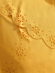 Ginger yellow hollow out T-shirt with scalloped edge detail and floral cutout pattern