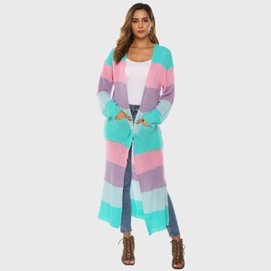 Detail of color block longline cardigan showing pockets and vibrant striped knit texture