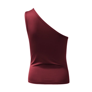 Detailed view of the burgundy asymmetrical one-shoulder tank top showing fabric and hem