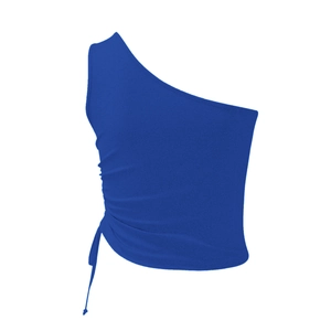 Detail of royal blue one-shoulder top featuring adjustable drawstring ruching and soft texture