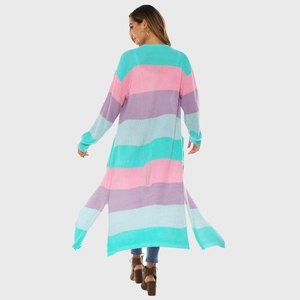 Detail view of side slits and multi-color pastel striped pattern on long cardigan