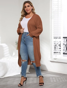 Close-up of a long brown knit cardigan for women with textured open-front design