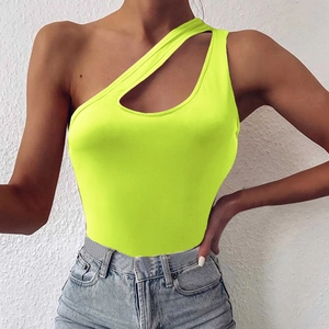 Detail of neon green one-shoulder crop top with cutout design and ribbed texture