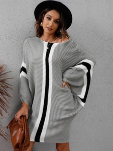 Oversized knitted dress with batwing sleeves and contrast stripes in a loose fit