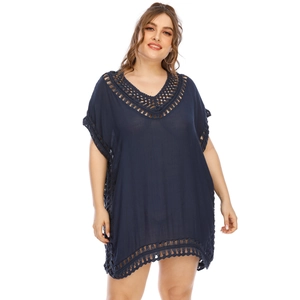 Detail of V-neck and hollow crochet craftsmanship on navy blue beach cover-up dress