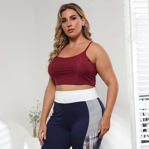 Detail of burgundy ribbed cropped camisole top with flexible athletic stretch fabric