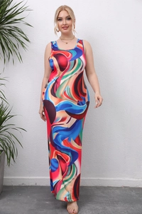 Close-up of vibrant abstract spiral print on a plus-size sleeveless maxi dress