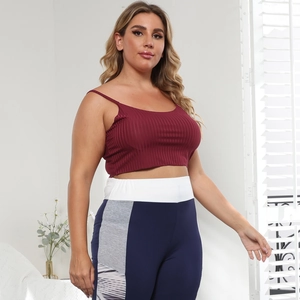 Women's burgundy ribbed crop top and color-block yoga pants set for fitness