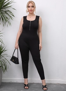 Detailed close-up of zipper neckline and ribbed texture on black sleeveless jumpsuit