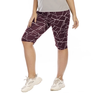 Detail of burgundy plus size biker shorts with white geometric lines and high elasticity