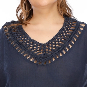 Women's V-neck navy blue beach dress featuring crochet lace details and lightweight fabric