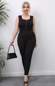 Close-up of the ribbed texture fabric and front zipper detail on black sleeveless jumpsuit