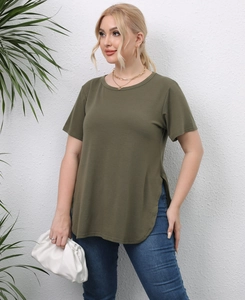 Detail view of army green T-shirt with side split hem and soft cotton fabric texture