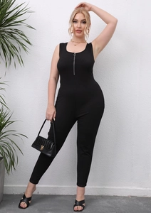 Detail of black ribbed bodysuit featuring a functional silver zipper and slim fit cut