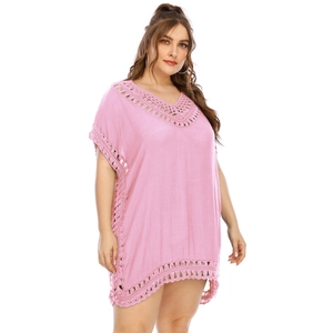 Pink plus size beach cover-up dress with crochet V-neck and hollow lace detailing
