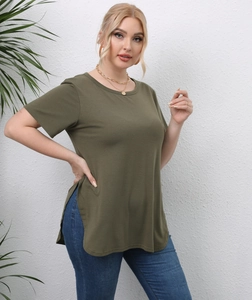 Detail view of the high side slit and soft cotton fabric on this olive green t-shirt