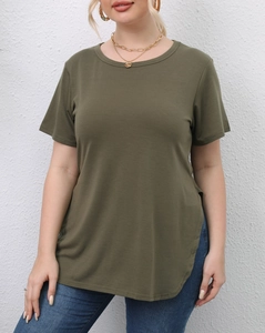 Detail of olive green short sleeve T-shirt with side slits and curved hem on model