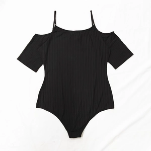 Sleek black ribbed bodysuit with cold-shoulder design and stretchy knit fabric