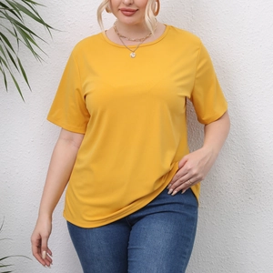 Detail of plus size ginger yellow t-shirt with round neck and premium textured fabric