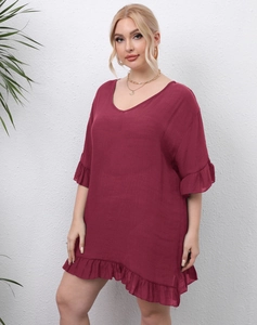 Detailed view of burgundy beach dress with elegant ruffle sleeves and V-neck design