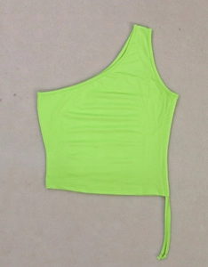 Detail of neon green one-shoulder crop top featuring adjustable drawstring side ruched hem