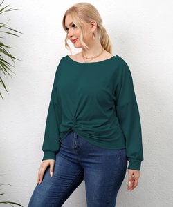 Plus size dark green long sleeve twist knot tunic top with slim blue denim jeans