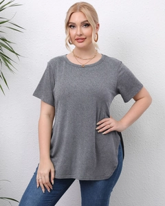 Detail of grey crewneck T-shirt with curved split hem and high-low loose fit design