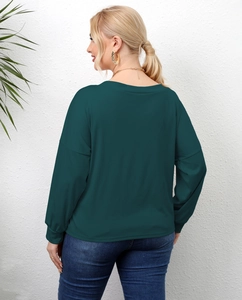 Back view of a plus-size dark green long sleeve T-shirt with drop shoulders and a loose fit