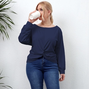 Detail view of navy blue plus size long sleeve top featuring a central front twist knot detail