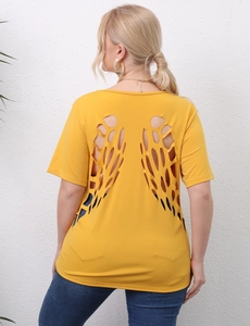 Detail of yellow short-sleeve top featuring intricate butterfly wing cut-out design on back