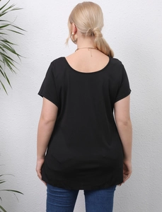 Back view of a loose fit black short-sleeved t-shirt for women with round neckline