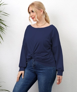 Detail of dark blue plus size long sleeve top with unique twist knot waist and crew neck
