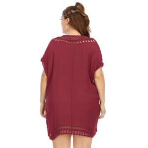 Detail of the back view of the burgundy crochet lace trim beach cover-up dress