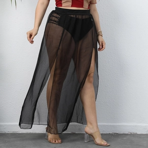Detail view of black sheer mesh beach cover-up skirt with elastic waist and high side slits
