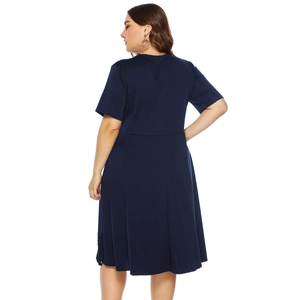 Detail of dark blue plus size midi dress featuring short sleeves and a slim waist design