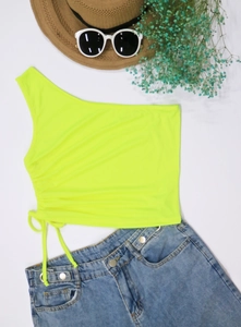 Neon green one-shoulder crop top featuring adjustable side drawstrings and ribbing