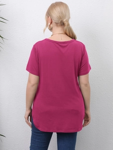 Back view of magenta crew neck t-shirt with curved split hem and smooth fabric