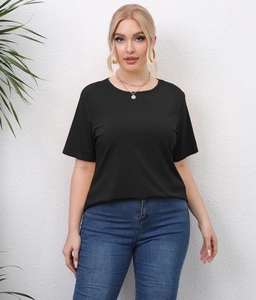 Detail of plus size black cotton T-shirt with crew neck and loose casual fit on model