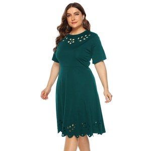 Women's plus size dark green A-line dress with laser-cut hollow details and short sleeves