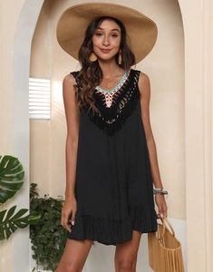 Sleeveless black tassel dress with colorful crochet trim for beach and summer vacations