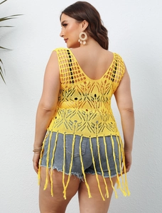 Plus size yellow crochet beach cover up with boho fringe details and hollow knit pattern