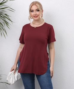 Close-up of wine red plus size T-shirt featuring a crew neck and side split hem detail