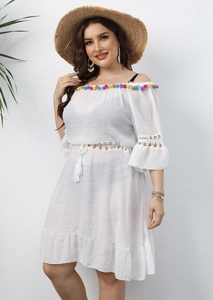 White off-shoulder beach cover-up dress with colorful pom-poms and fringe details