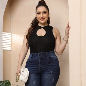 Plus size black cutout bodysuit paired with high waist triple button blue jeans